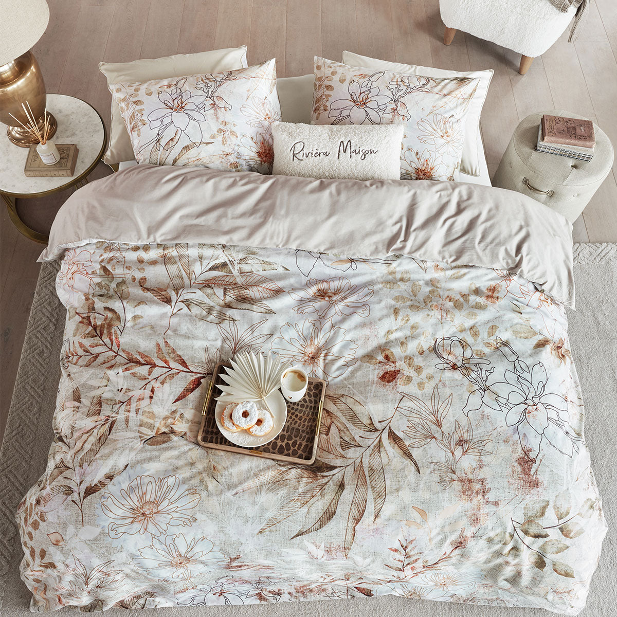 Riviera Maison Everlasting Natural Cotton Quilt Cover Set featuring floral and leaf patterns on a textured background, ideal for a chic bedroom decor.