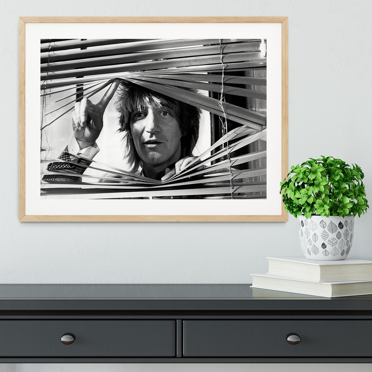 Framed print of Rod Stewart from 1983, showcasing vibrant colors and high-quality craftsmanship.