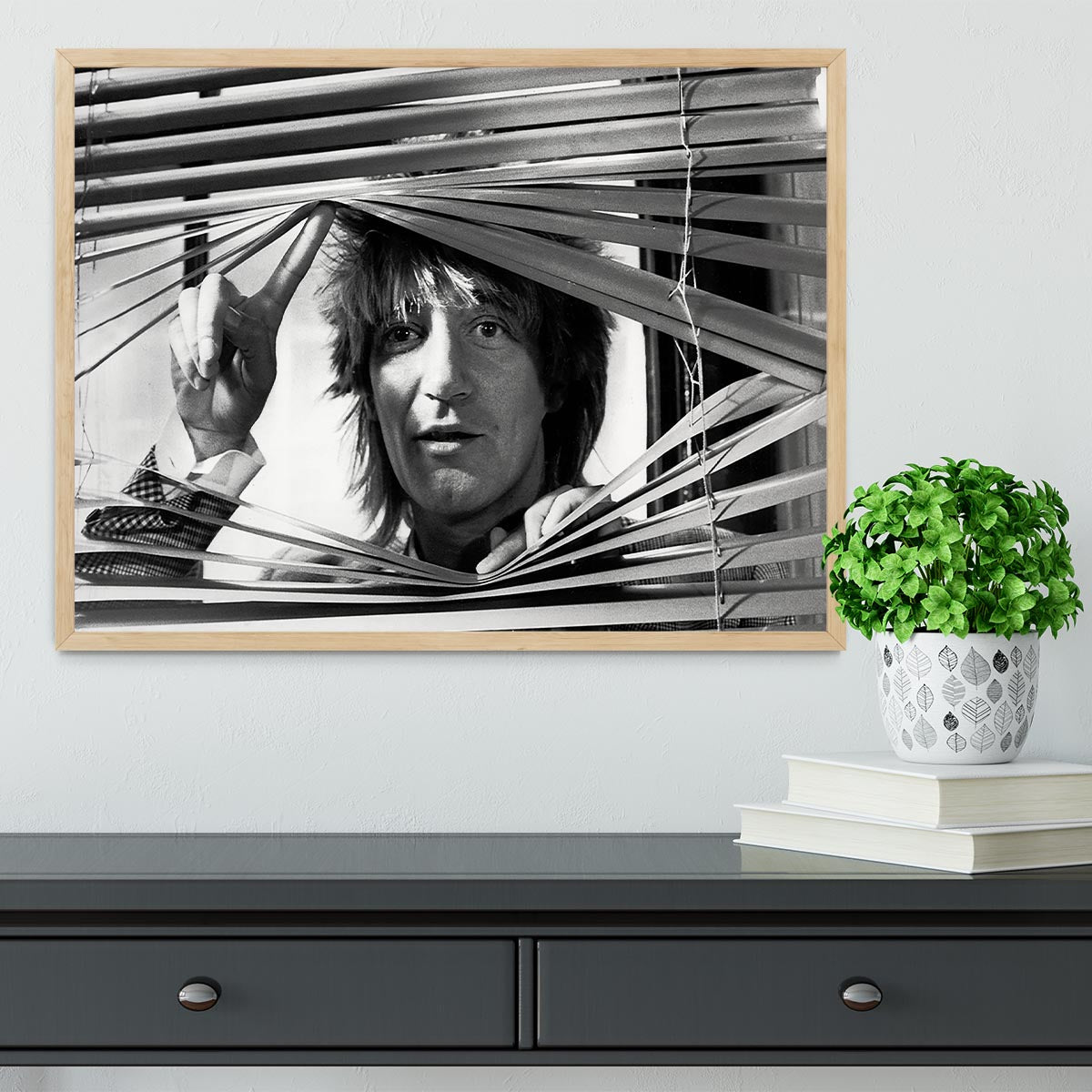 Framed print of Rod Stewart from 1983, showcasing vibrant colors and high-quality craftsmanship.