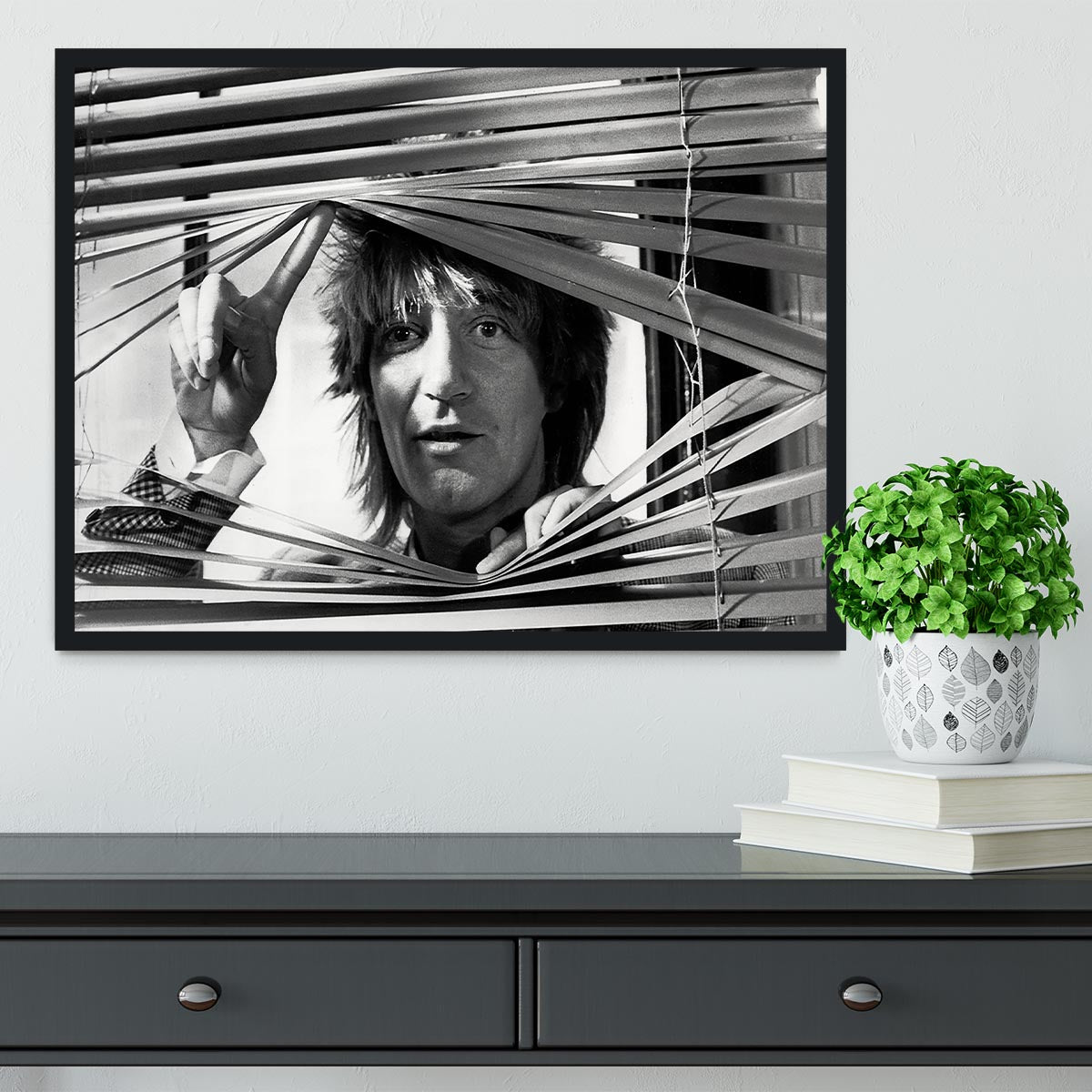 Framed print of Rod Stewart from 1983, showcasing vibrant colors and high-quality craftsmanship.