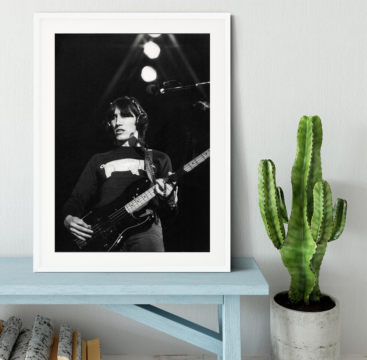 A beautifully framed print of Roger Waters, showcasing vibrant colors and high-quality craftsmanship in a stylish frame.