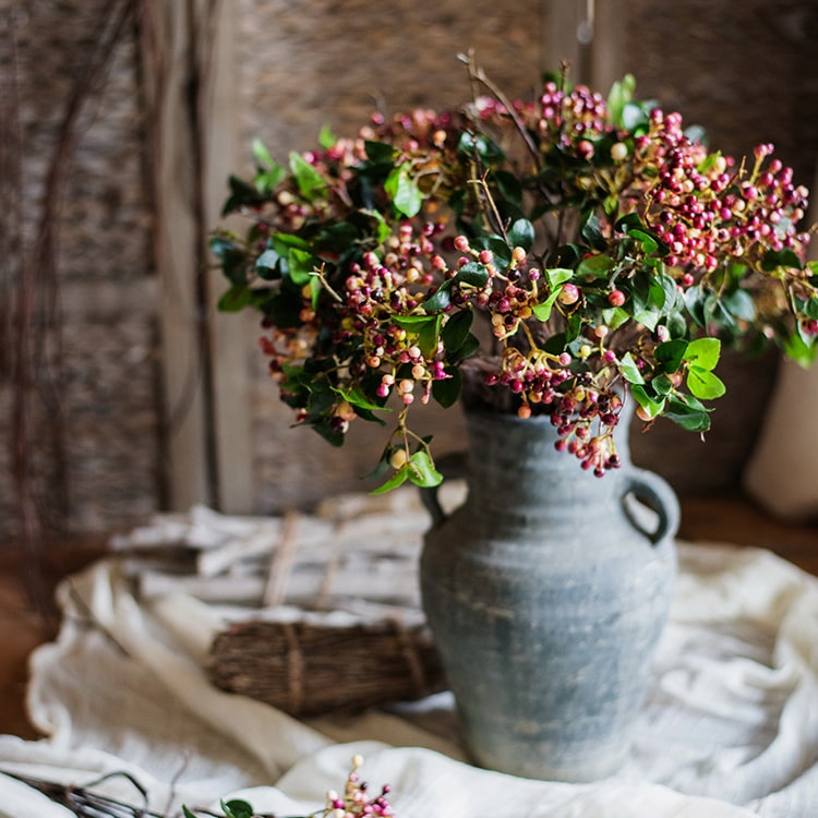 A beautiful bunch of artificial Rose Purple Elder flowers, featuring vibrant colors and realistic leaves, standing 22 inches tall.
