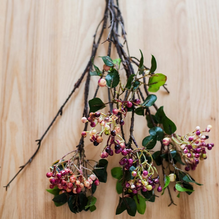 A beautiful bunch of artificial Rose Purple Elder flowers, featuring vibrant colors and realistic leaves, standing 22 inches tall.