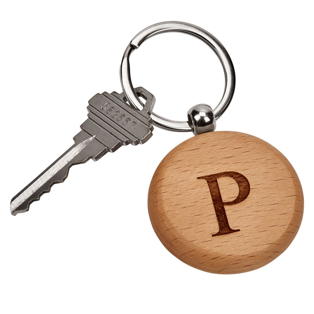 A beautifully crafted 1.75" round wood keychain with smooth finish, perfect for engraving.
