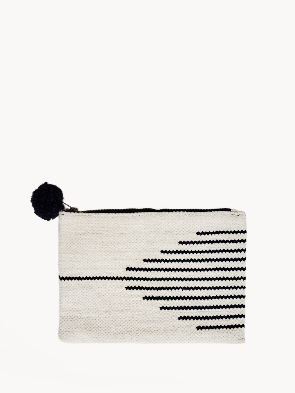 Sada Clutch made from recycled chenille fabric, featuring a soft texture and neutral colors, perfect for fall and winter.