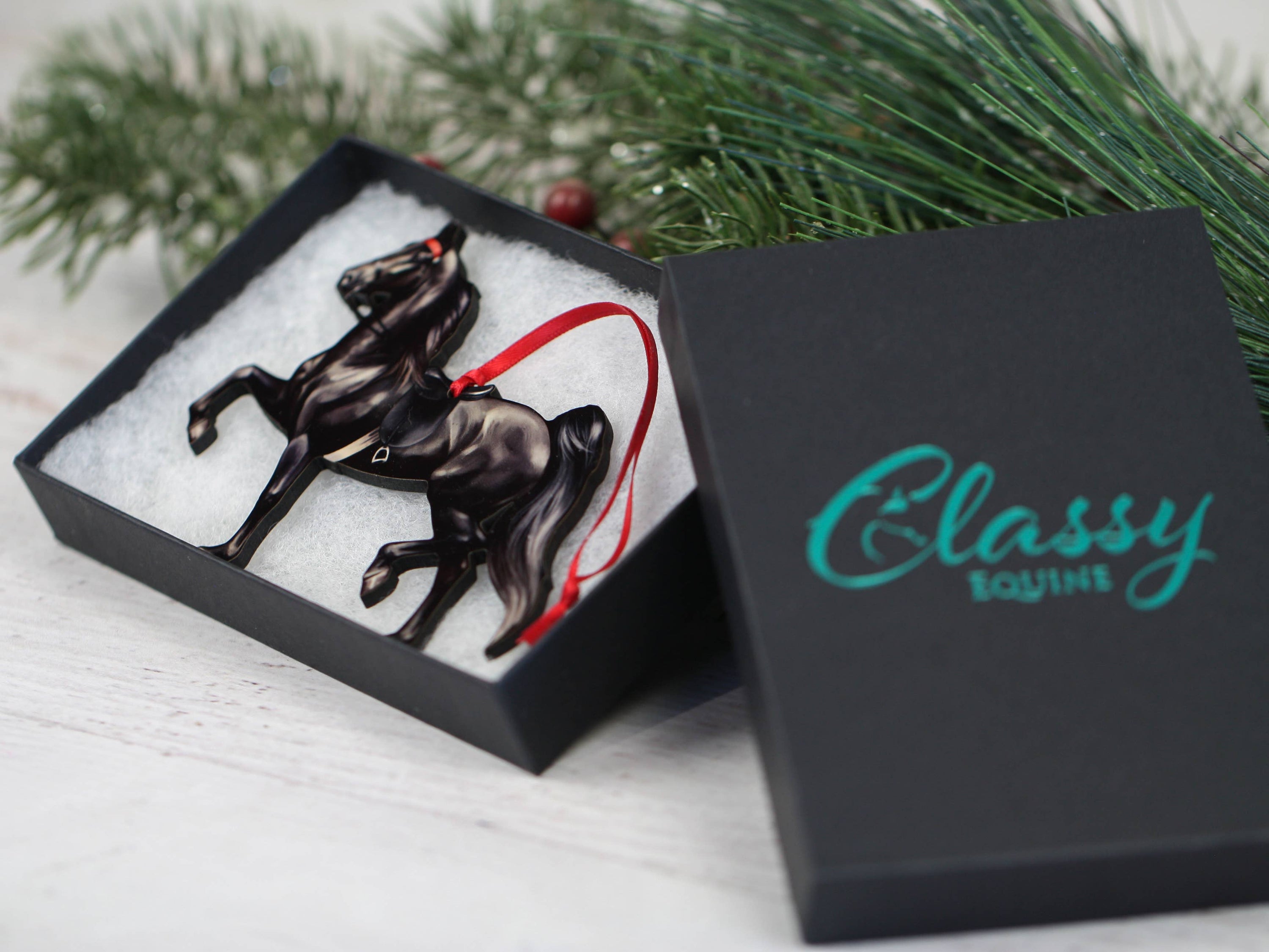 Saddlebred Horse Ornament in black, handmade from composite wood, featuring a glossy finish and intricate laser-cut design.