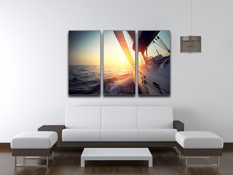 A beautiful 3-panel canvas print featuring a sailboat gliding across serene waters, perfect for home decor.