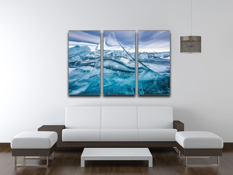 A beautiful 3-panel canvas print depicting a serene winter lake scene, perfect for home or office decor.