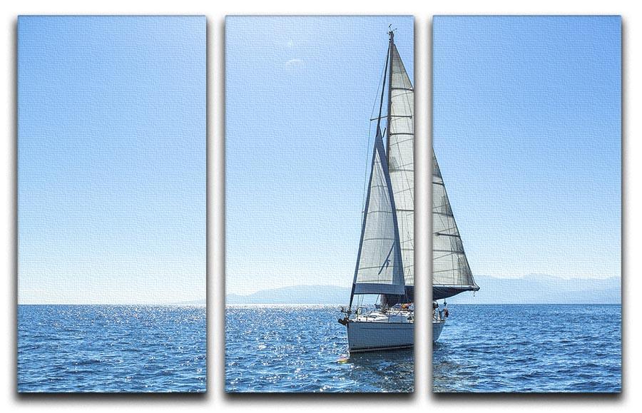 A beautiful 3-panel canvas print featuring sailing ships with white sails against a serene backdrop, perfect for home decor.