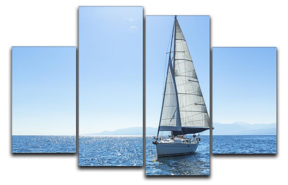 A beautiful 4-split canvas artwork featuring sailing ships with white sails, creating a serene nautical scene.