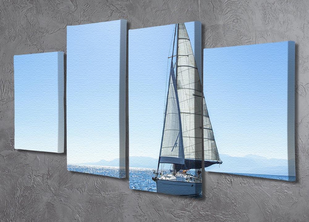 A beautiful 4-split canvas artwork featuring sailing ships with white sails, creating a serene nautical scene.