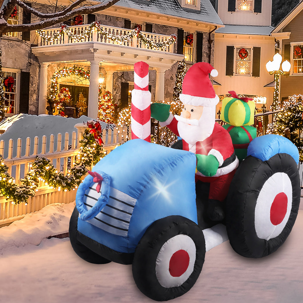 Santaco Inflatable Christmas Decor Tractor Santa with LED lights, standing 1.4 meters tall, perfect for festive outdoor decoration.