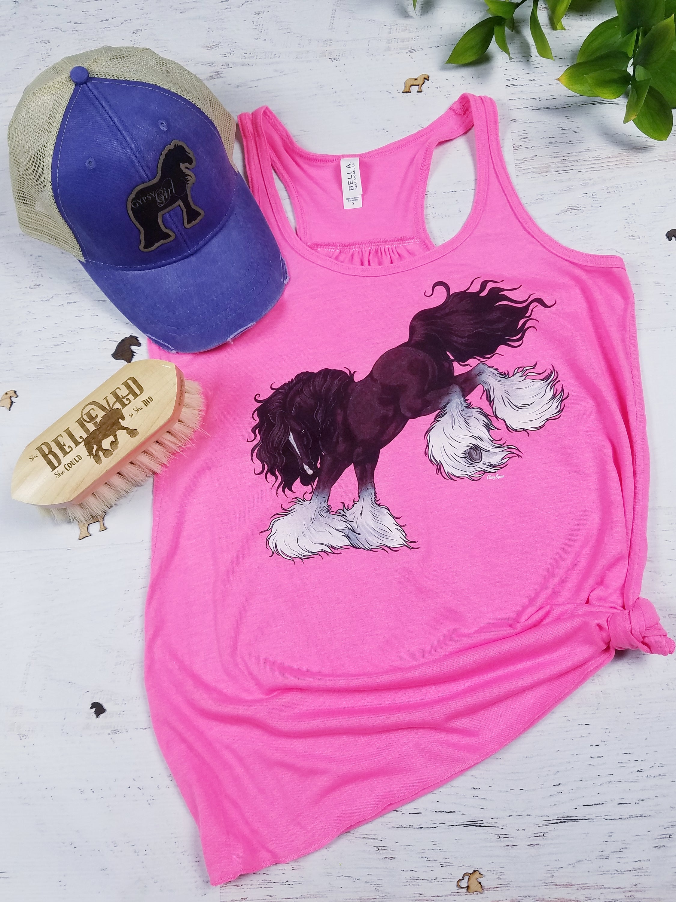 A stylish Sassy Bucking Gypsy flowy tank top featuring a fun design, perfect for casual wear and outdoor activities.