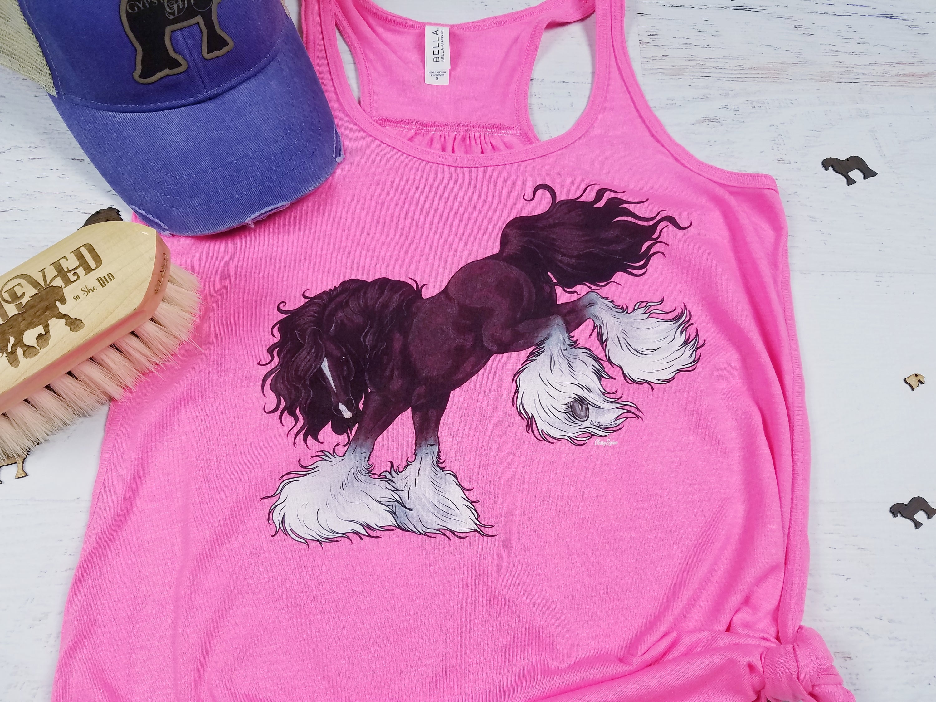 A stylish Sassy Bucking Gypsy flowy tank top featuring a fun design, perfect for casual wear and outdoor activities.