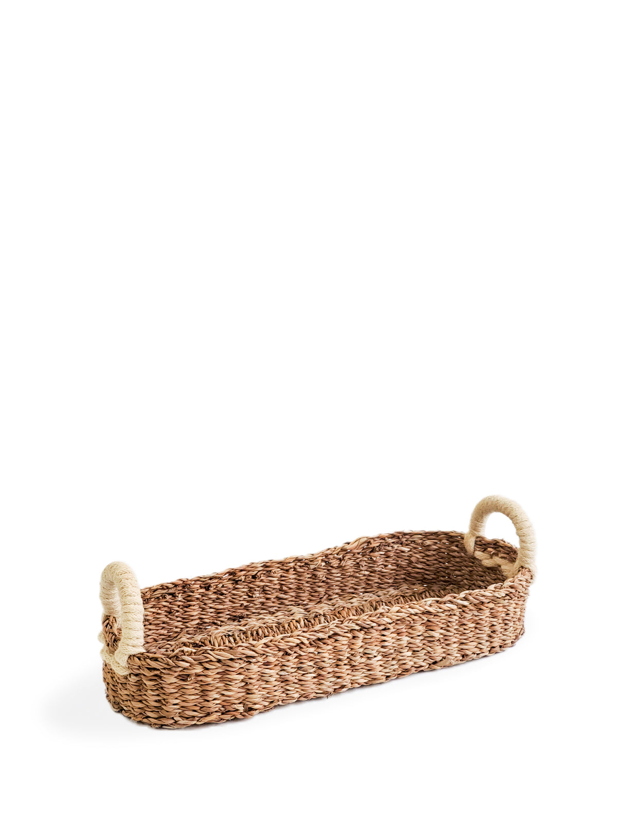 Savar Bread Basket with White Handle, handmade from seagrass, showcasing its natural color and jute handle.