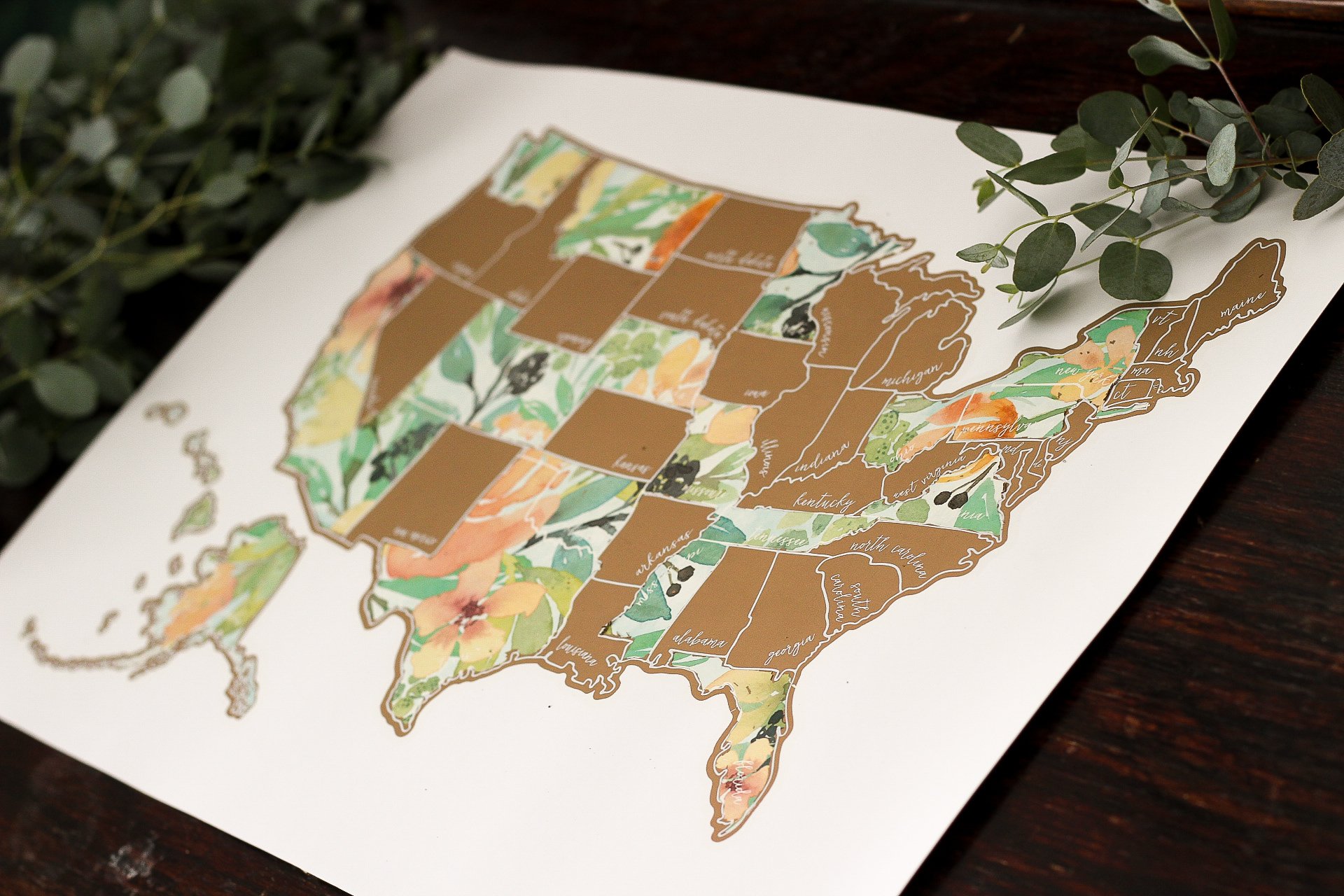 Scratch Your Travels Peachy Botanicals USA Map featuring gold scratch-off states and vibrant watercolor design.