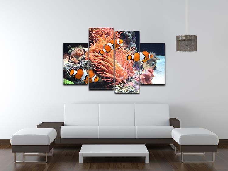 A beautiful 4-panel canvas artwork featuring vibrant sea anemones, showcasing intricate details and colors that enhance any room's decor.