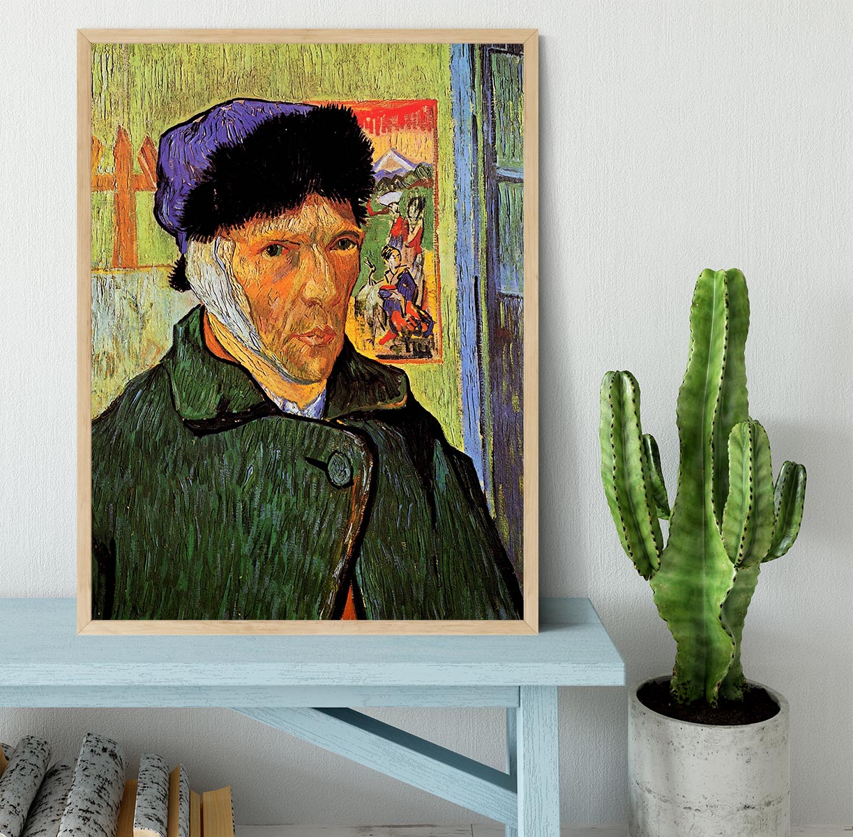 Framed print of Van Gogh's Self-Portrait with Bandaged Ear, showcasing vibrant colors and intricate details.