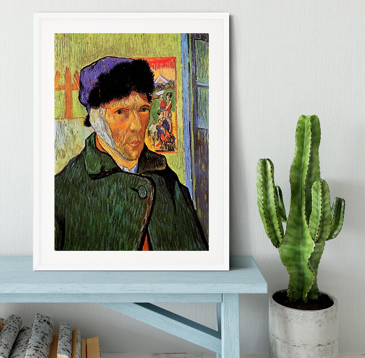 Framed print of Van Gogh's Self-Portrait with Bandaged Ear, showcasing vibrant colors and intricate details.