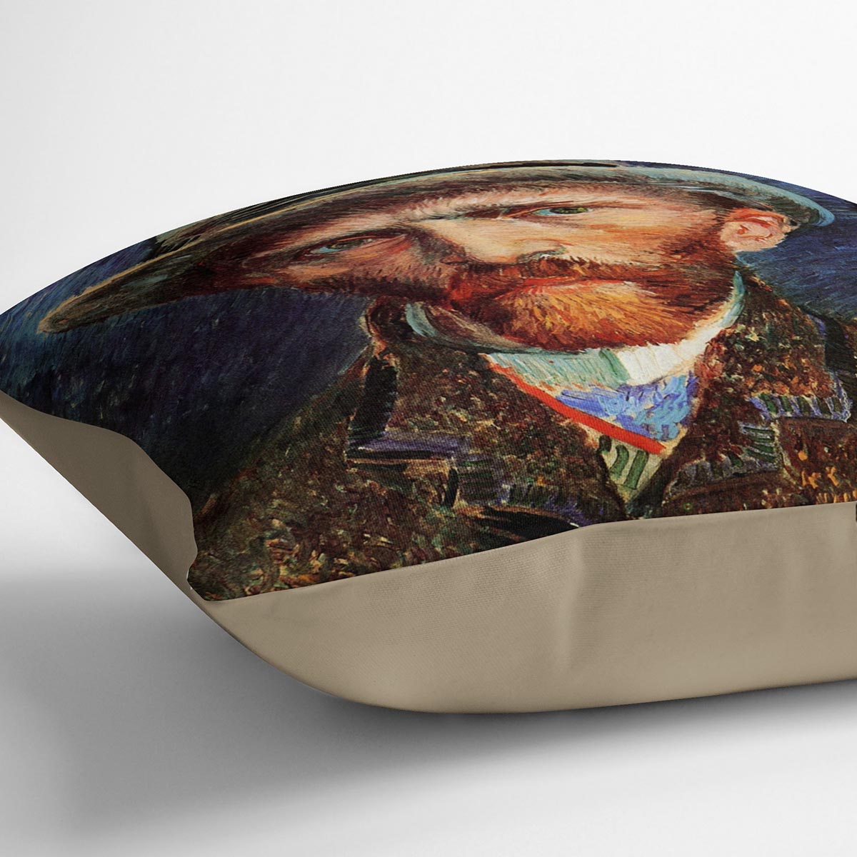 A plush cushion featuring Van Gogh's Self-Portrait with Grey Felt Hat, made from luxurious vegan faux suede, showcasing vibrant colors and intricate details.