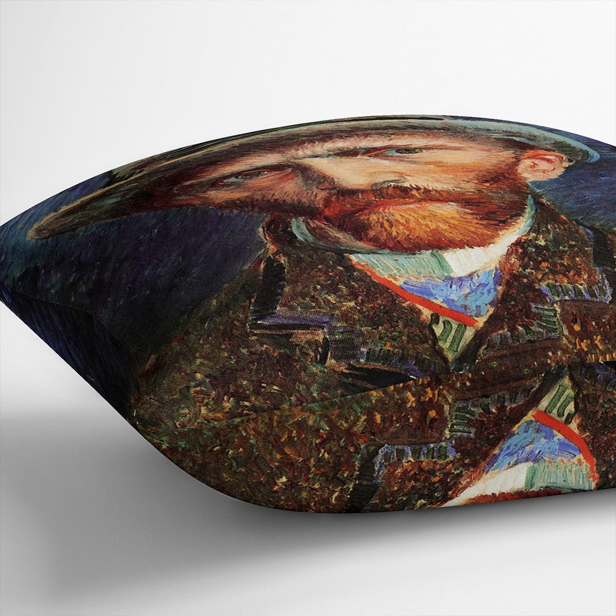 A plush cushion featuring Van Gogh's Self-Portrait with Grey Felt Hat, made from luxurious vegan faux suede, showcasing vibrant colors and intricate details.