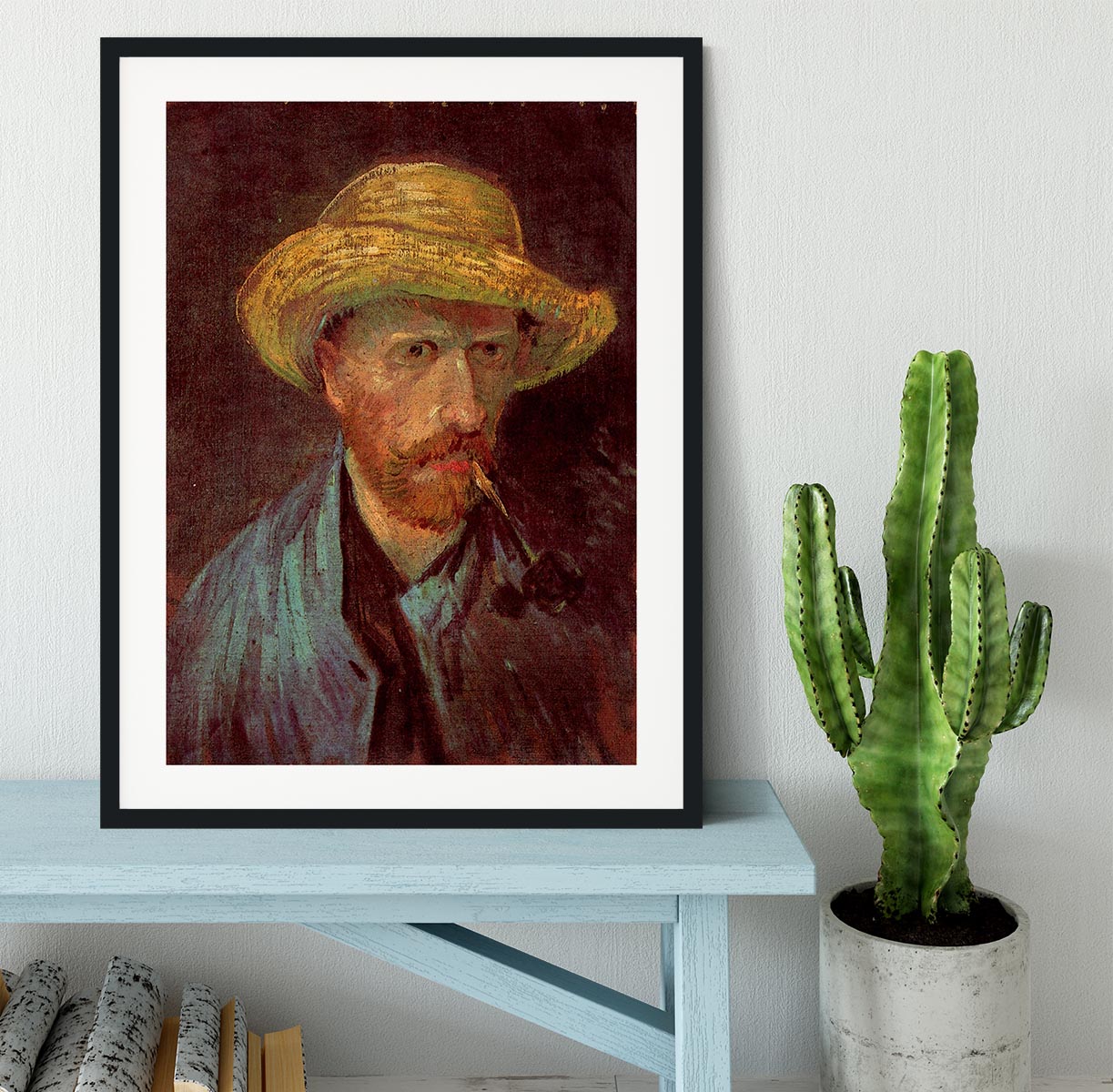 Framed print of Van Gogh's Self-Portrait with Straw Hat and Pipe, showcasing vibrant colors and quality craftsmanship.