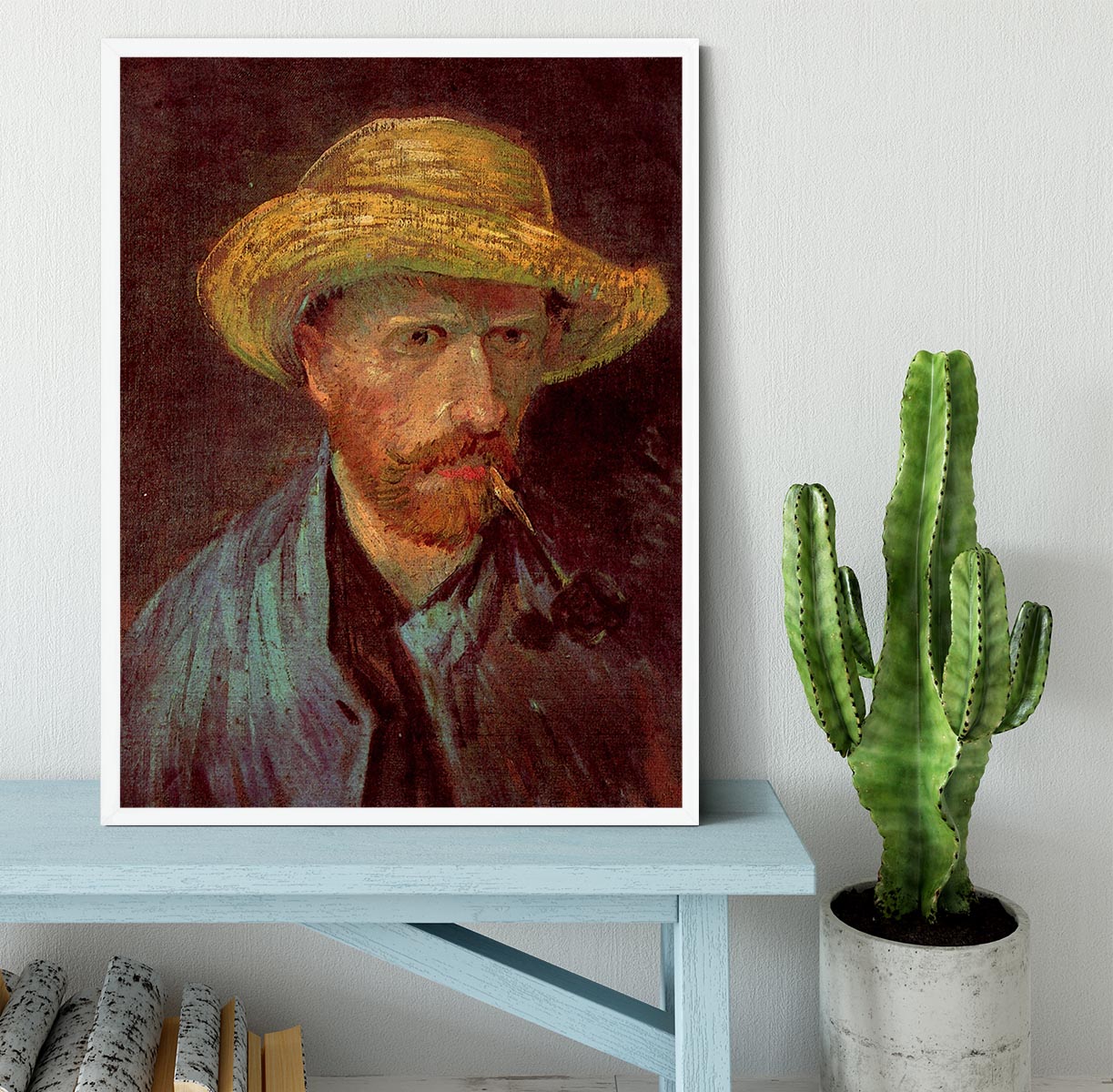 Framed print of Van Gogh's Self-Portrait with Straw Hat and Pipe, showcasing vibrant colors and quality craftsmanship.