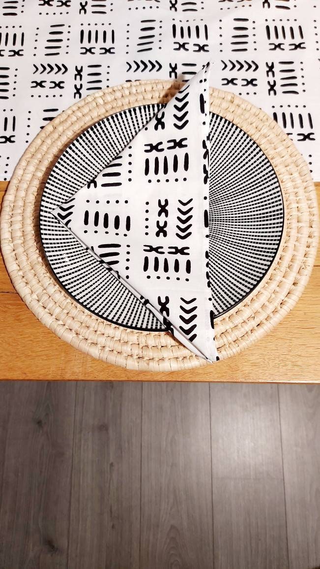 Set of 4 or 8 white mudcloth print napkins, showcasing a stylish African design on premium cotton fabric.