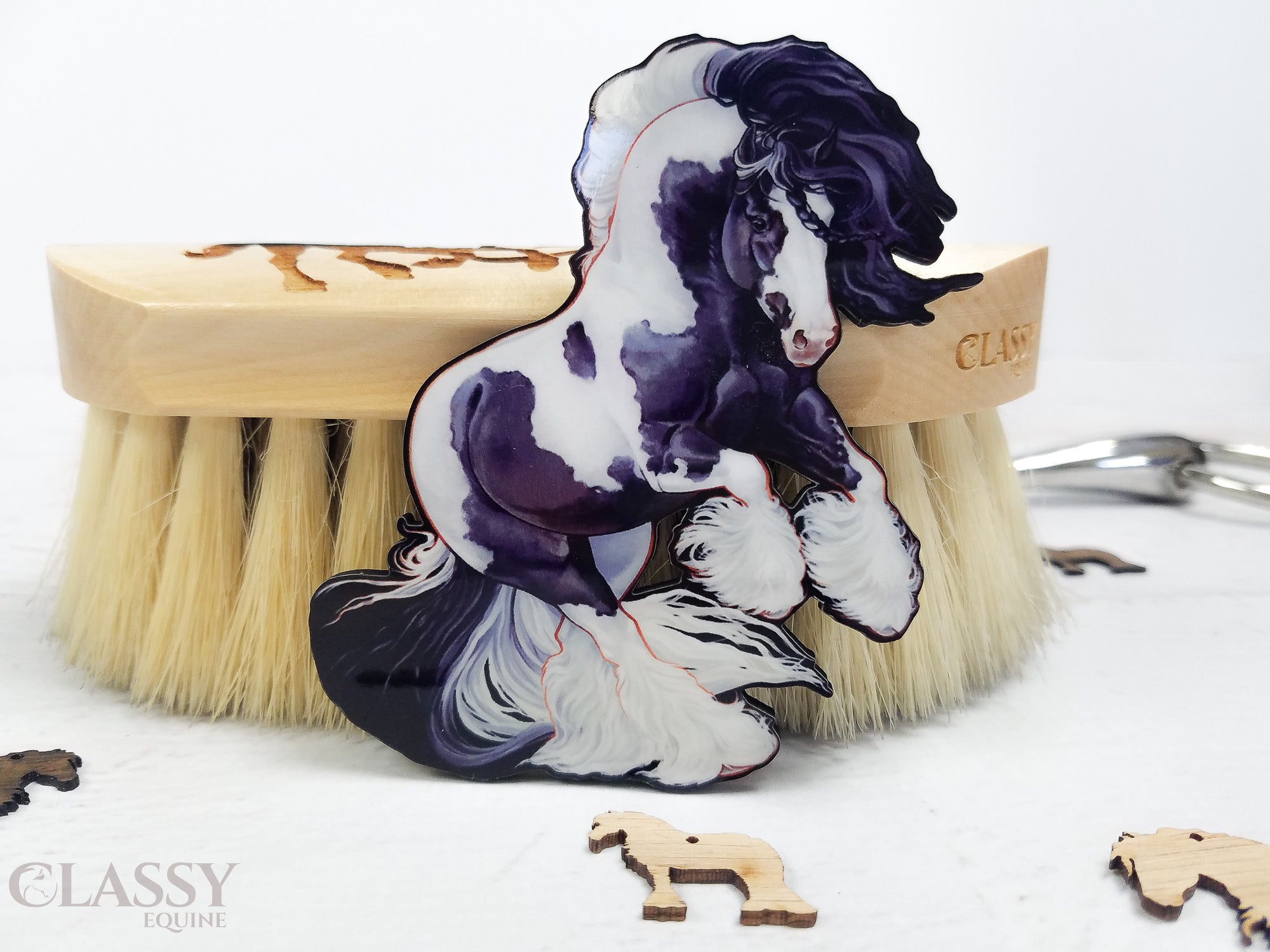 Set of 4 handmade Gypsy Horse ornaments made from composite wood, featuring intricate laser-cut designs and ribbons for hanging.