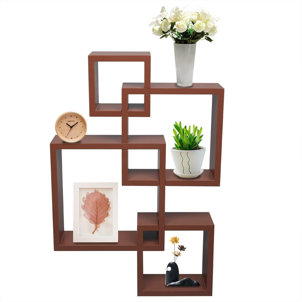 Set of 4 intersecting decorative wall shelves in white, black, and brown, showcasing stylish home storage solutions.