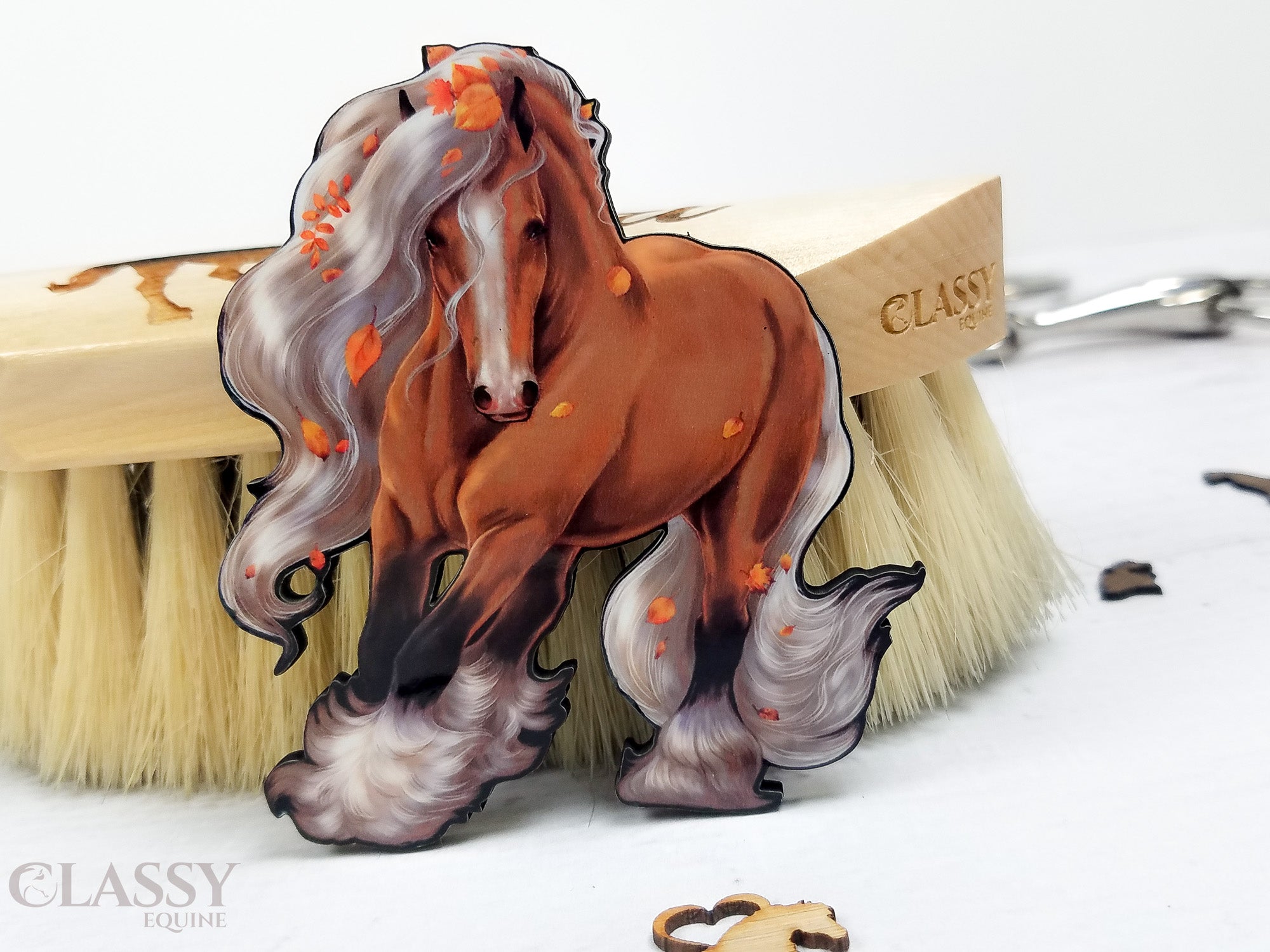 Set of two handmade Autumn Gypsy Horse ornaments, intricately designed and crafted from composite wood, featuring ribbons for hanging.