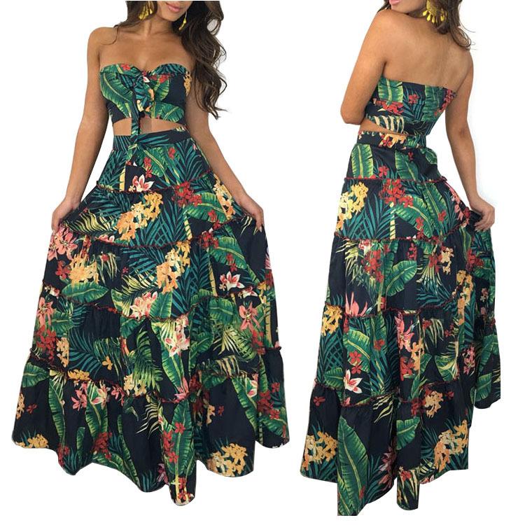 A stylish two-piece dress set featuring a strapless top and a tropical wrap skirt in vibrant green, perfect for summer outings.