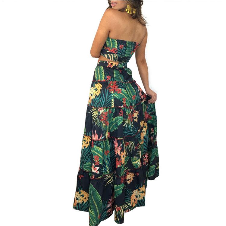 A stylish two-piece dress set featuring a strapless top and a tropical wrap skirt in vibrant green, perfect for summer outings.