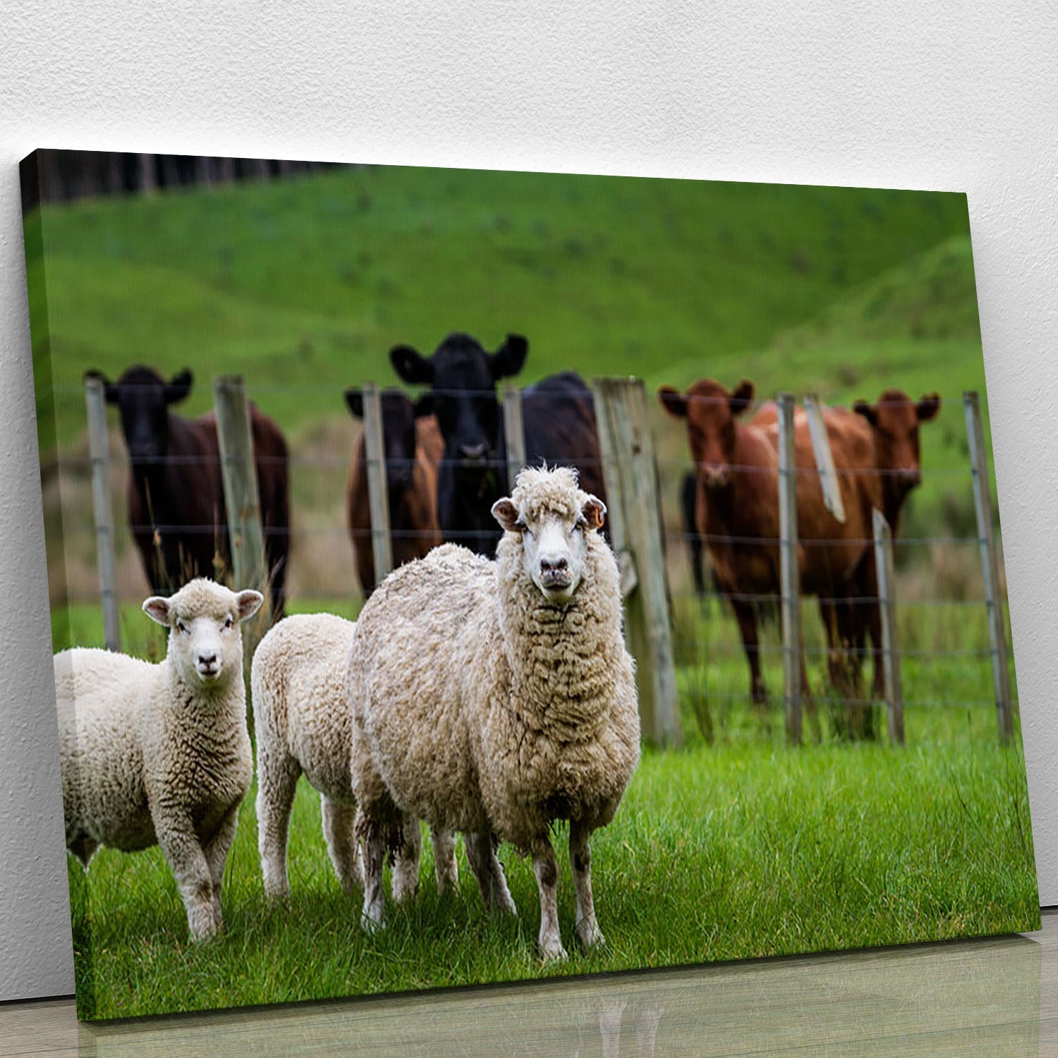 A beautiful canvas print featuring sheep and cows in a serene pastoral landscape, perfect for home decor.