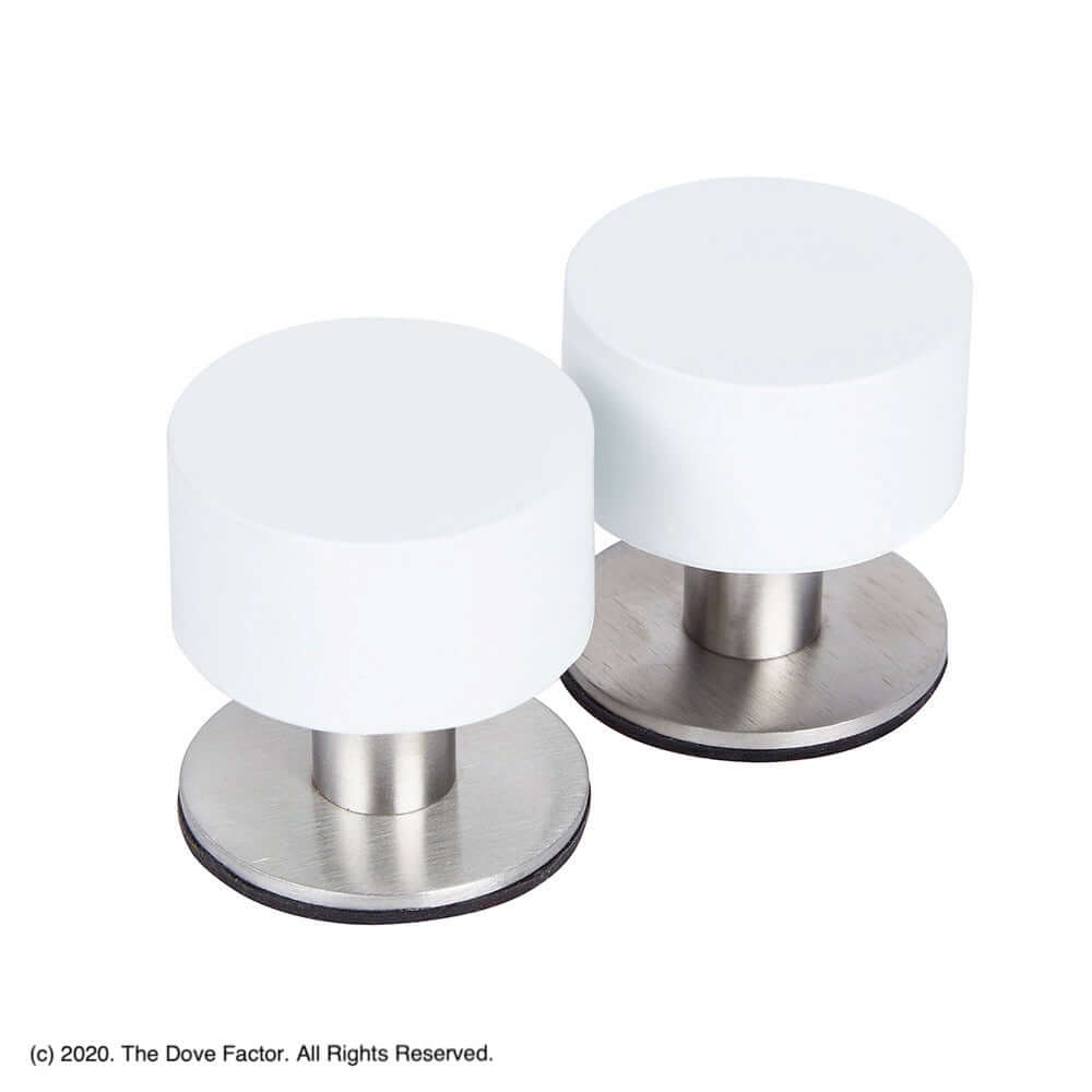 Short white door stop with screws, made of stainless steel, designed for wall and floor protection, featuring a sleek and modern aesthetic.