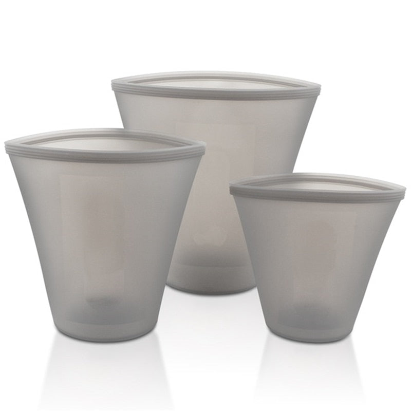 A colorful set of silicone food storage containers including bowls and cups, showcasing their versatility and reusable design.