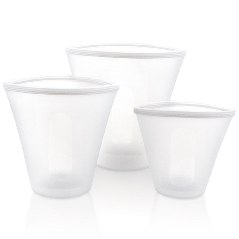 A colorful set of silicone food storage containers including bowls and cups, showcasing their versatility and reusable design.