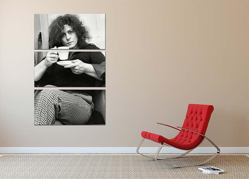 A stylish 3-panel canvas print featuring singer Marc Bolan enjoying tea, perfect for home decor.