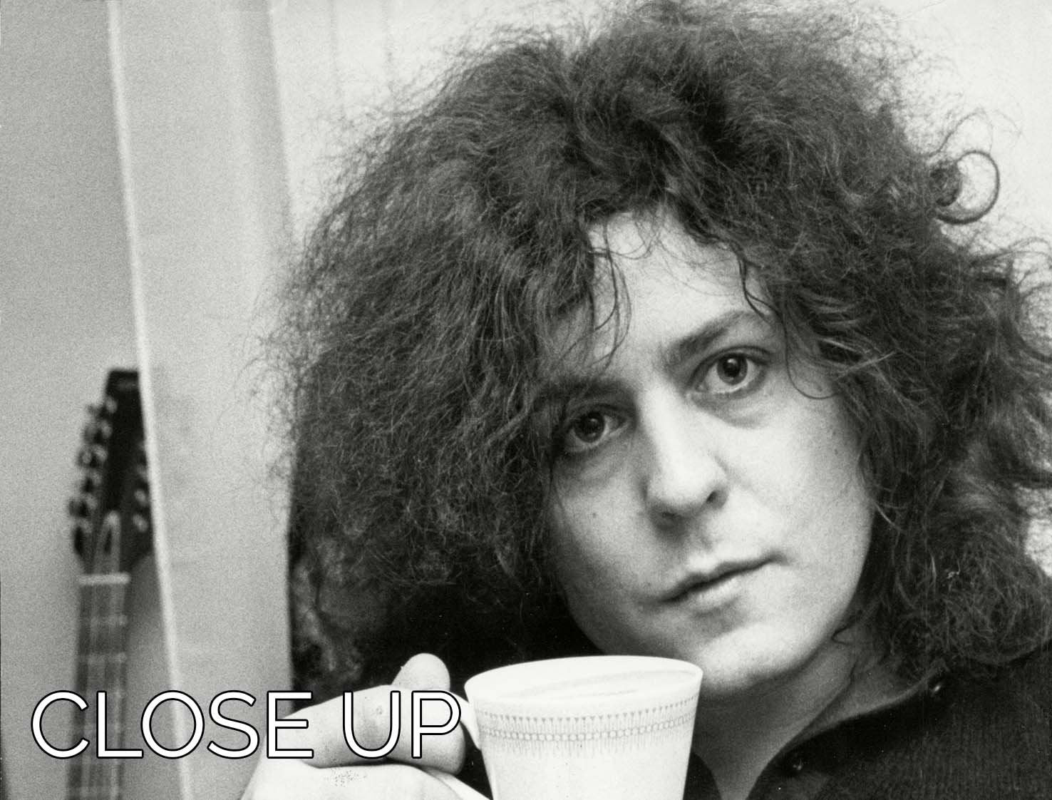 A stylish 3-panel canvas print featuring singer Marc Bolan enjoying tea, perfect for home decor.