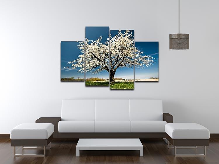 A beautiful 4-panel canvas artwork featuring a single blossoming tree in spring, showcasing vibrant flowers and a serene background.