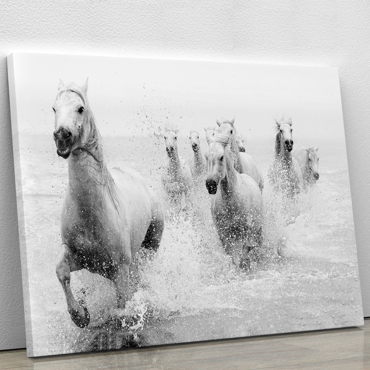 A vibrant canvas print featuring dynamic horses in motion, showcasing their strength and elegance.