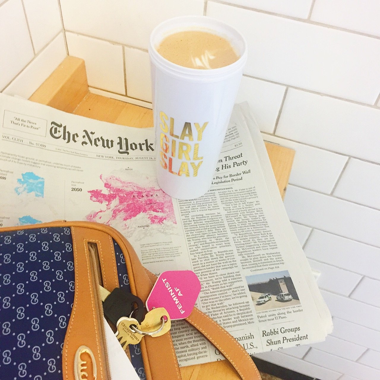 Stylish Slay Girl Slay Travel Mug with pink lid and metallic gold lettering, perfect for coffee and tea lovers.