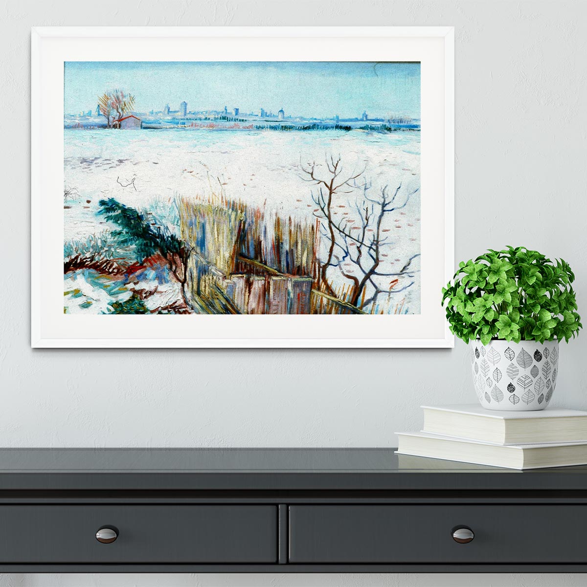 Framed print of Van Gogh's snowy landscape with Arles in the background, showcasing vibrant colors and intricate details.
