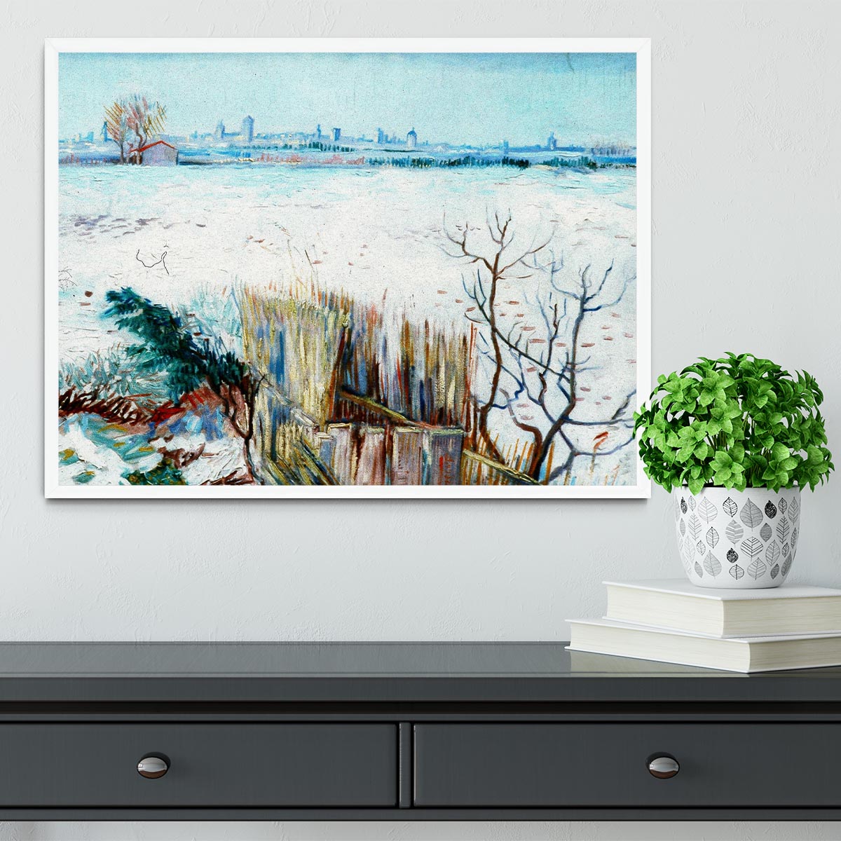Framed print of Van Gogh's snowy landscape with Arles in the background, showcasing vibrant colors and intricate details.