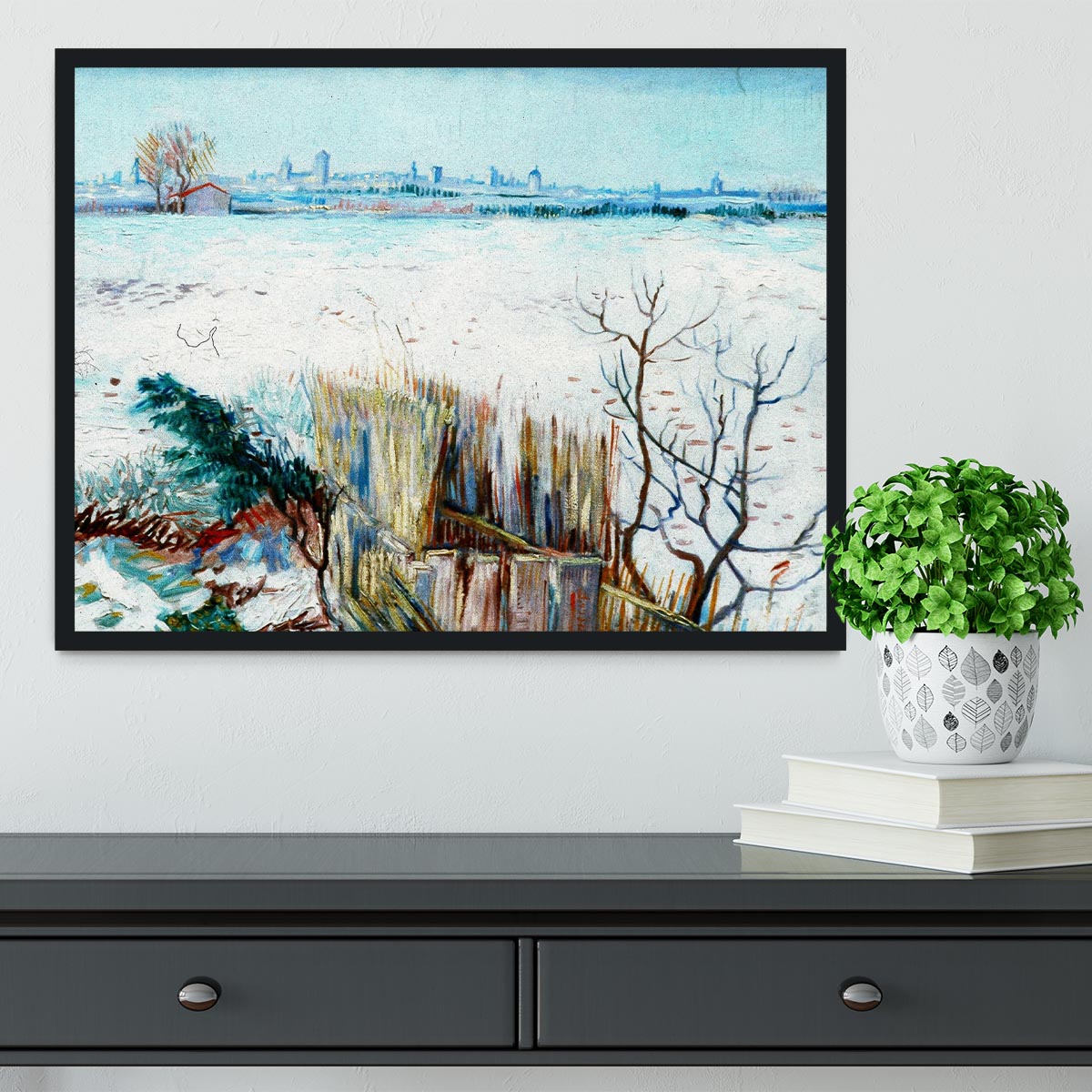 Framed print of Van Gogh's snowy landscape with Arles in the background, showcasing vibrant colors and intricate details.