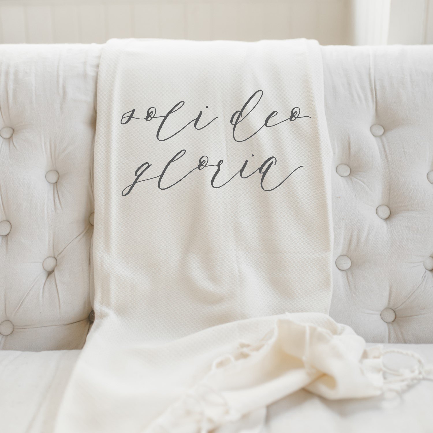 Soli Deo Gloria Decorative Throw Blanket in natural color, showcasing its soft texture and elegant design, perfect for home decor.
