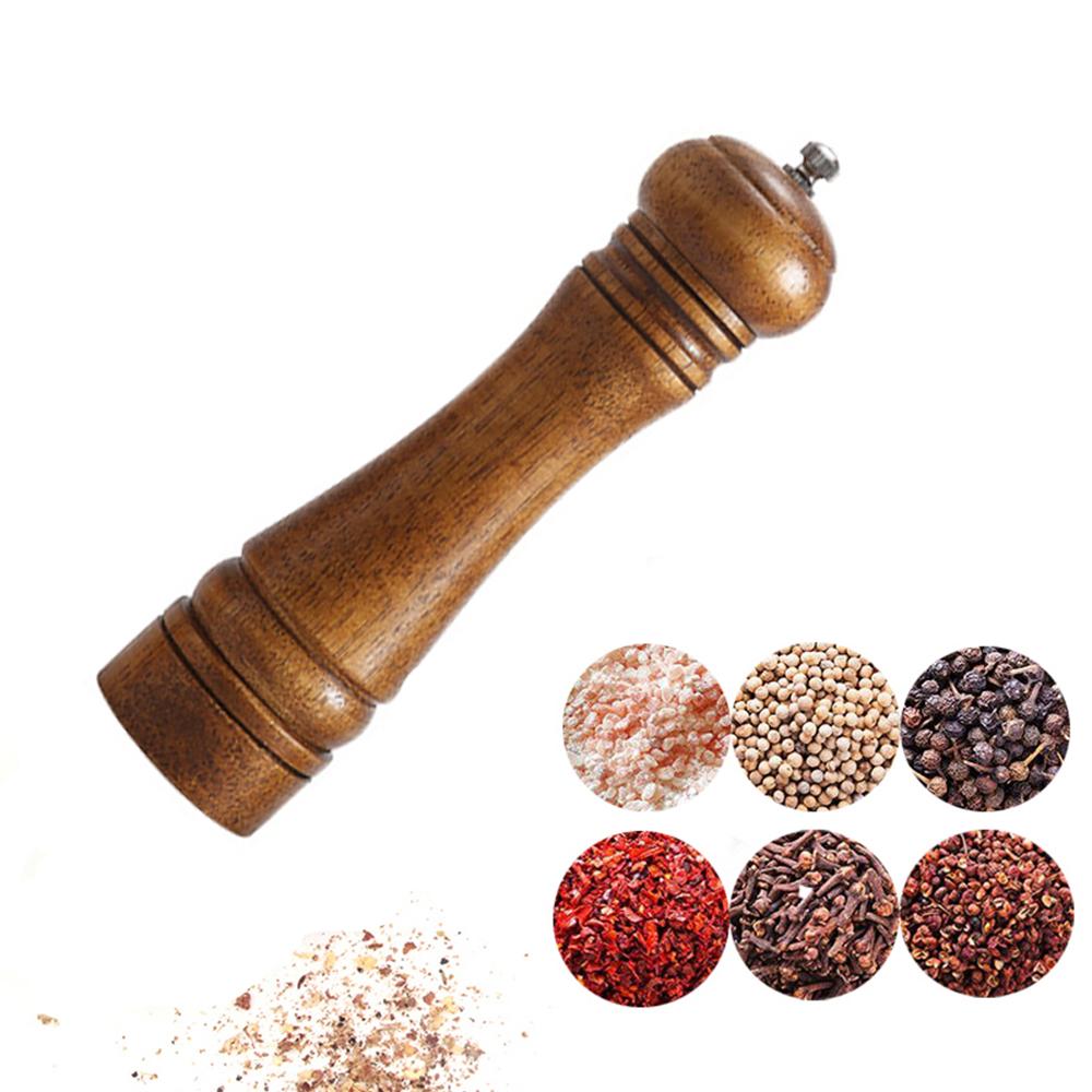 Solid Oak Spice Grinder in three sizes, showcasing its elegant design and ceramic grinding mechanism.