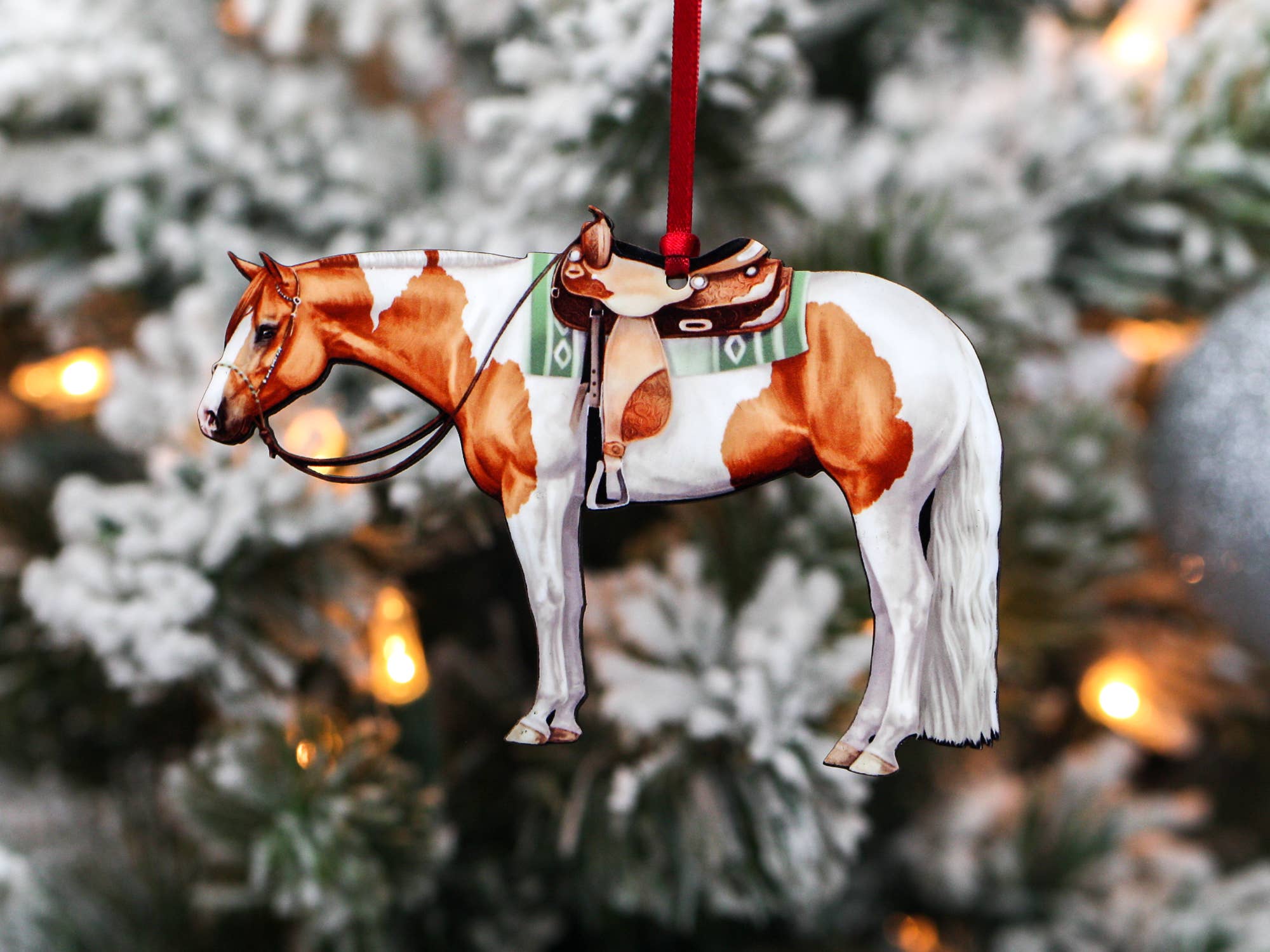 Chestnut and white tobiano Paint Horse ornament made of composite wood, featuring a glossy finish and intricate laser-cut design.