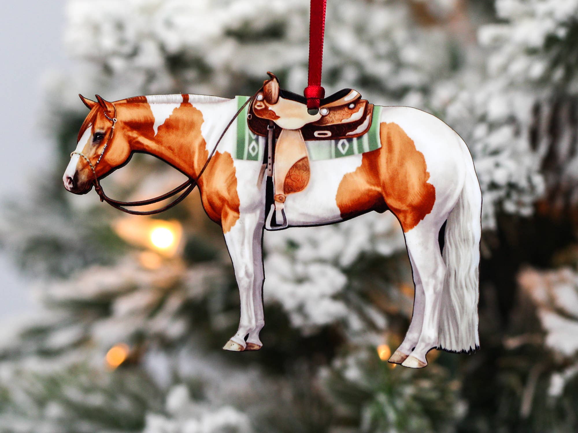 Chestnut and white tobiano Paint Horse ornament made of composite wood, featuring a glossy finish and intricate laser-cut design.