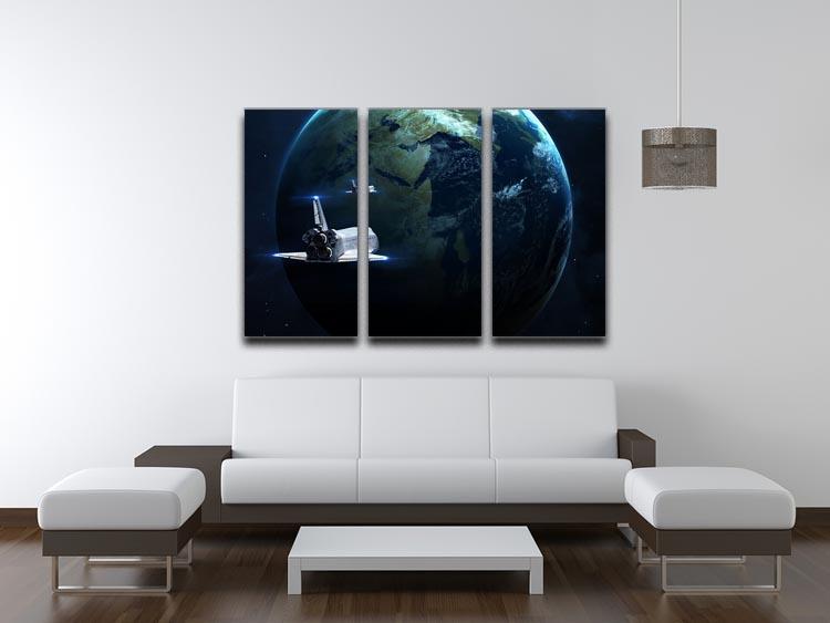 A stunning 3-panel canvas print featuring a space shuttle flying back to Earth, showcasing vibrant colors and intricate details.